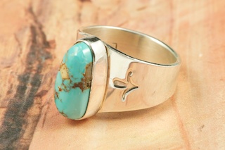 Genuine Royston Turquoise Stone set in Sterling Silver Ring. The Royston Turquoise Mine is located in Nye County, Nevada. Created by Navajo Artist Larson Lee.

